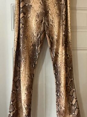 Tark’1 Speciality “snake print” pants